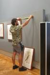 Installing one of our paintings.jpg