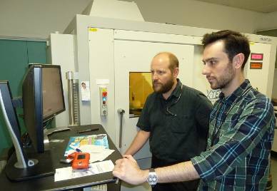 Thomas Simonsen and Daniel Martin-Vega operating Micro-CT scanner.jpg