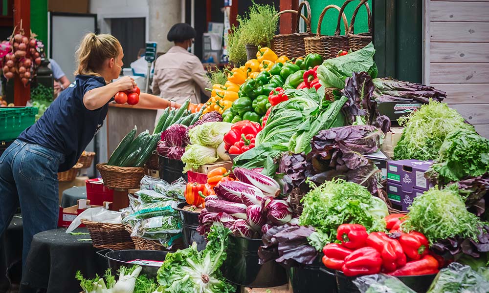 A food market stall selling fruit and vegetables