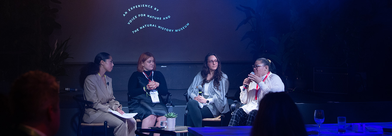 A pannel of speakers at the COP Nature Bar