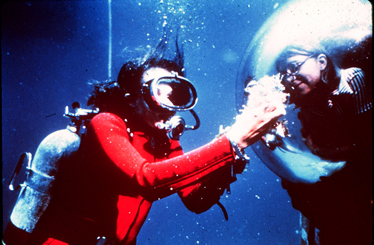 Dr Sylvia Earle displays samples to an aquanaut inside TEKTITE