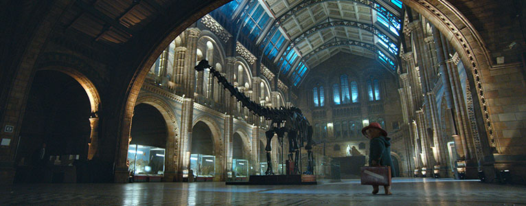 Paddington Bear at the Museum with Dippy in Hintze Hall.