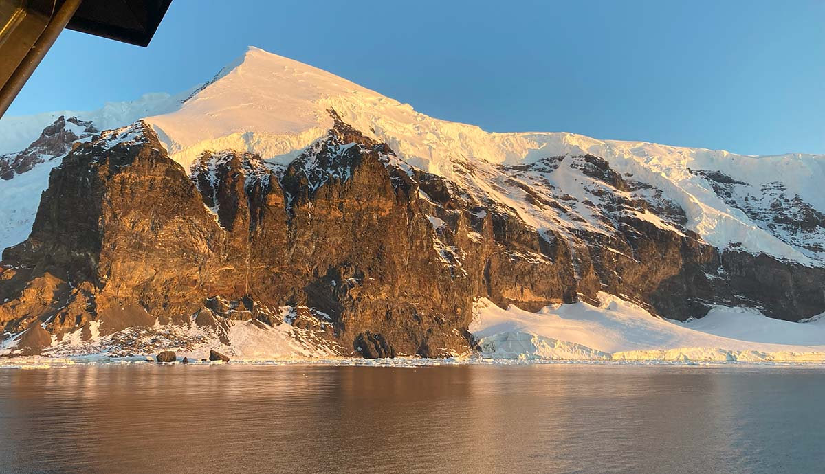 Sheer cliffs capped with snow along the coast of Coulman Island.
