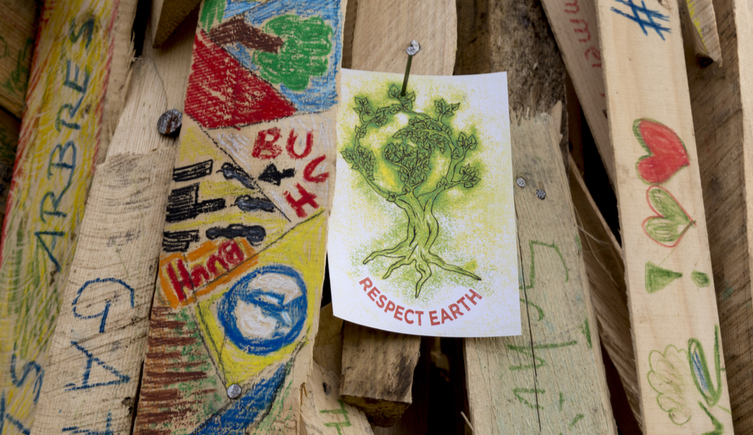 Protest signs left by activists at COP 23 in Bonn, Germany