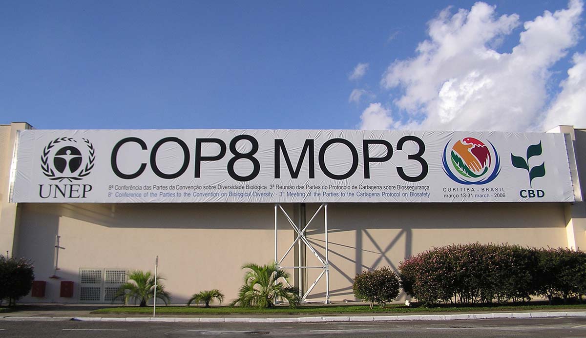 A building with a COP8 sign on the side.