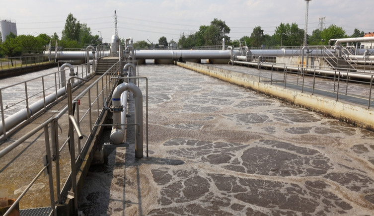 Water flows through a wastewater treatment facility