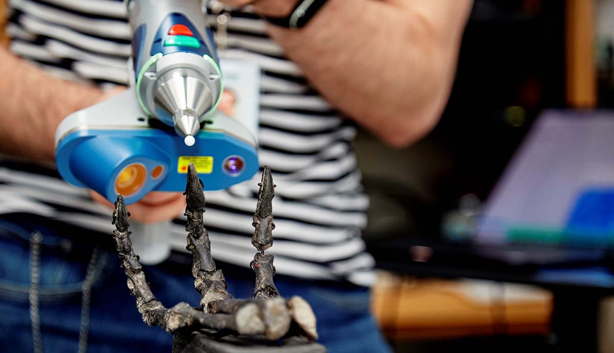A hand of Enigmacursor is digitised by a handheld 3D scanner.