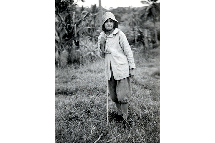 Lucy Evelyn Cheesman in the field wearing sack cloth trousers