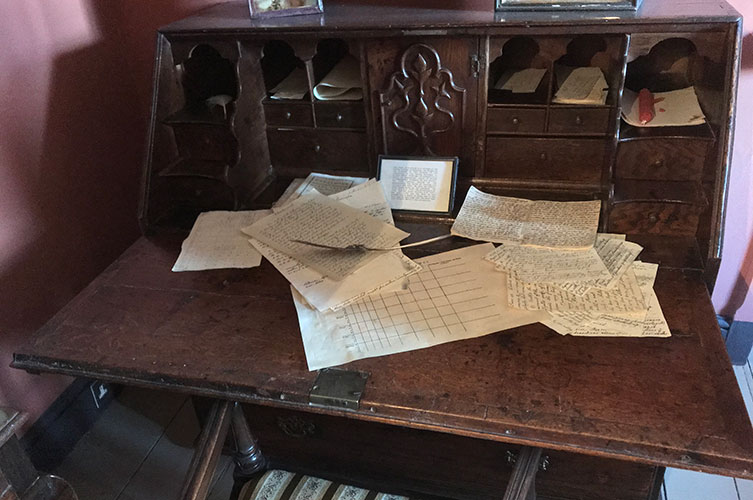Gilbert White's original desk, strewn with some of his writings