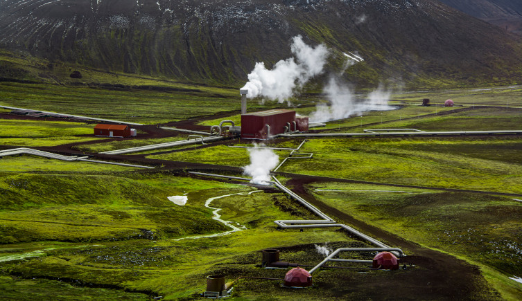 A geothermal power station among grass in Iceland