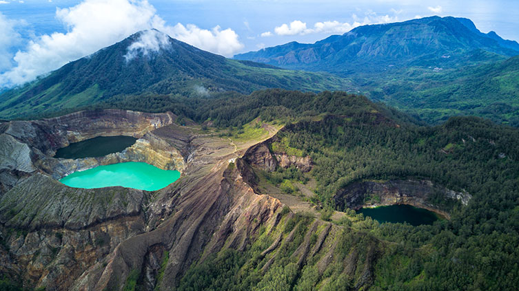 Three lakes that have formed in craters left behind by volcanic eruptions