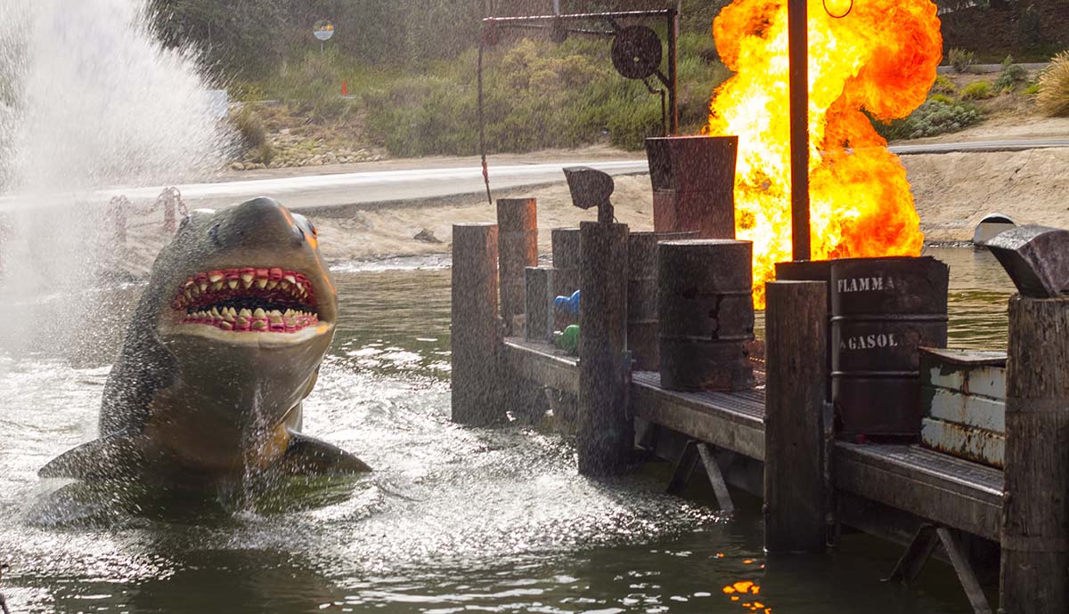 A robotic shark lunges out of the water at Universal Studios’ Jaws ride.