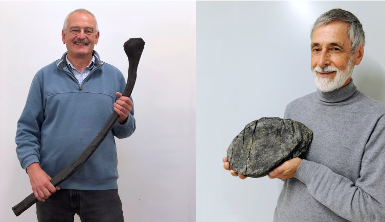 Prof Martin Sander (left) holds one of the rib fossils, while co-author Dr Heinz Furrer (right) hold a vertebrae