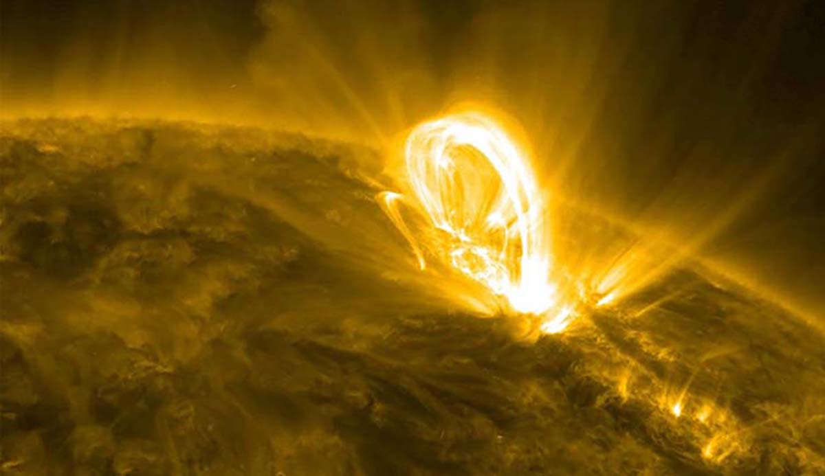 A magnetic arch on the Sun’s surface, seen under ultraviolet light.