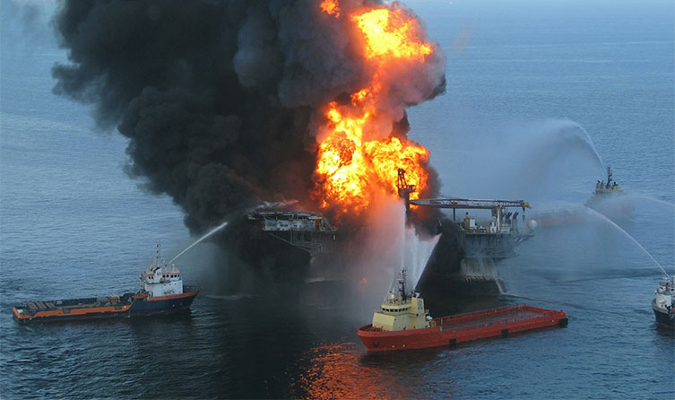 The Deepwater Horizon rig in flames in 2010.