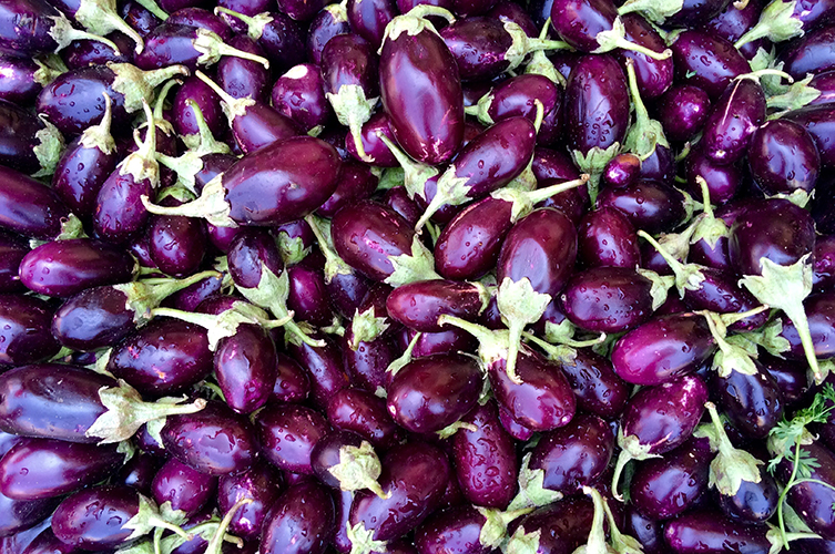 A pile of aubergines.