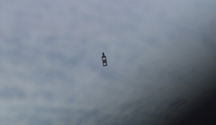 A photo of an eyebolt in orbit