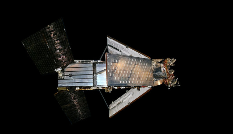 A satellite on a black background