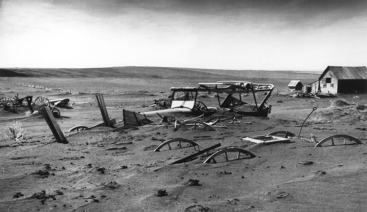 A car buried by soil carried by a severe dust storm