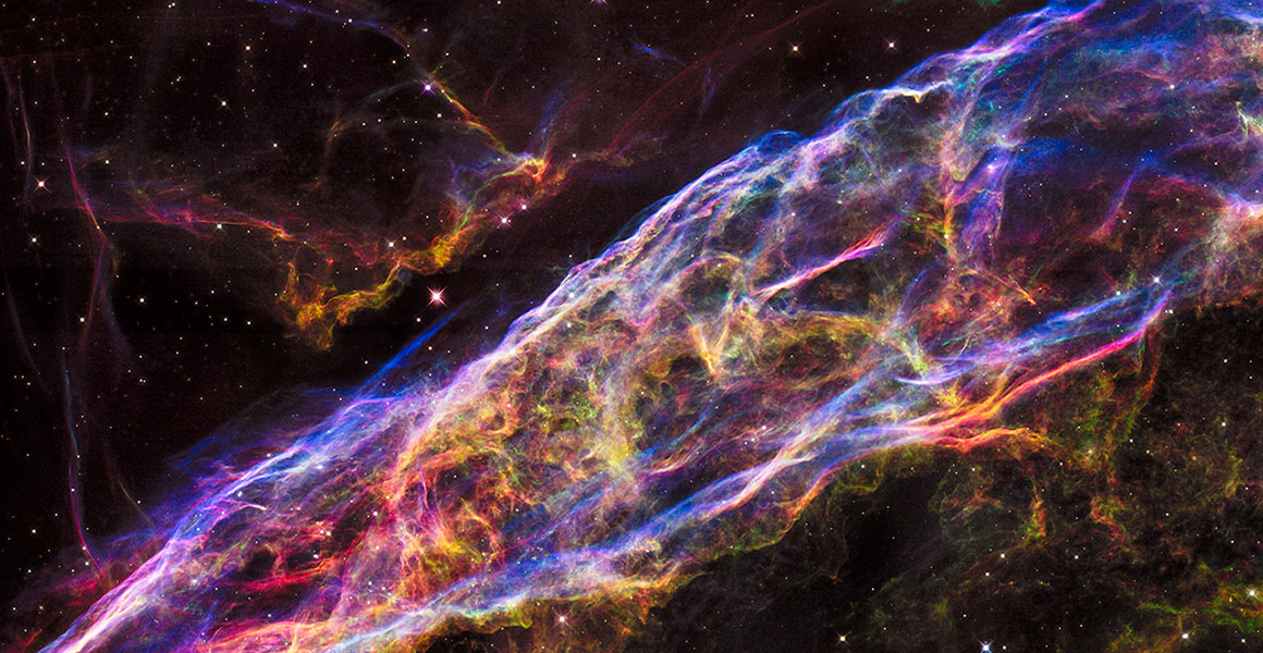 Brightly coloured swirling gases from the remnants of a massive exploded star. 