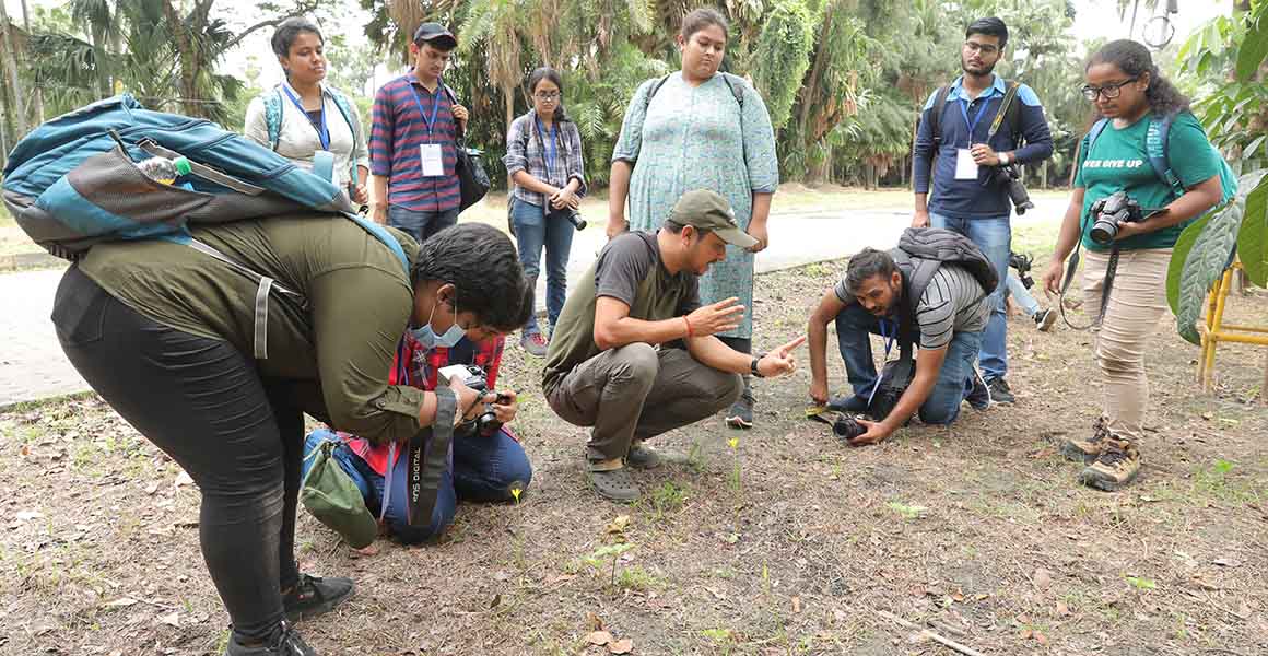 Young Minds for a Compassionate World attendees practice their camera skills 