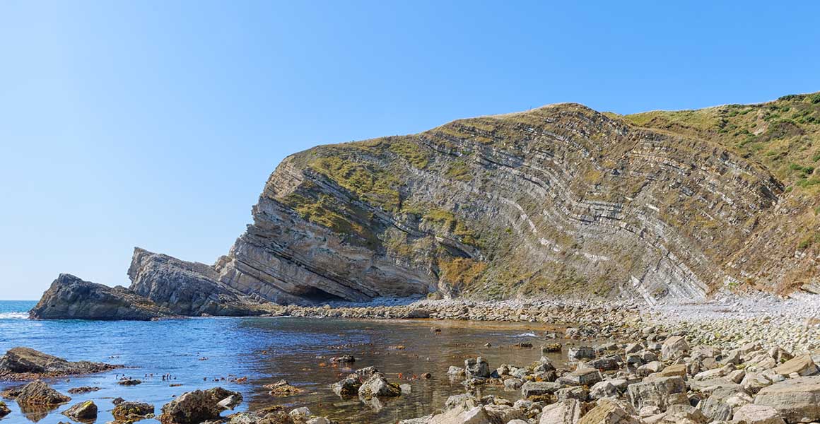 A picture of stratified rock on the Jurassic Coast. 