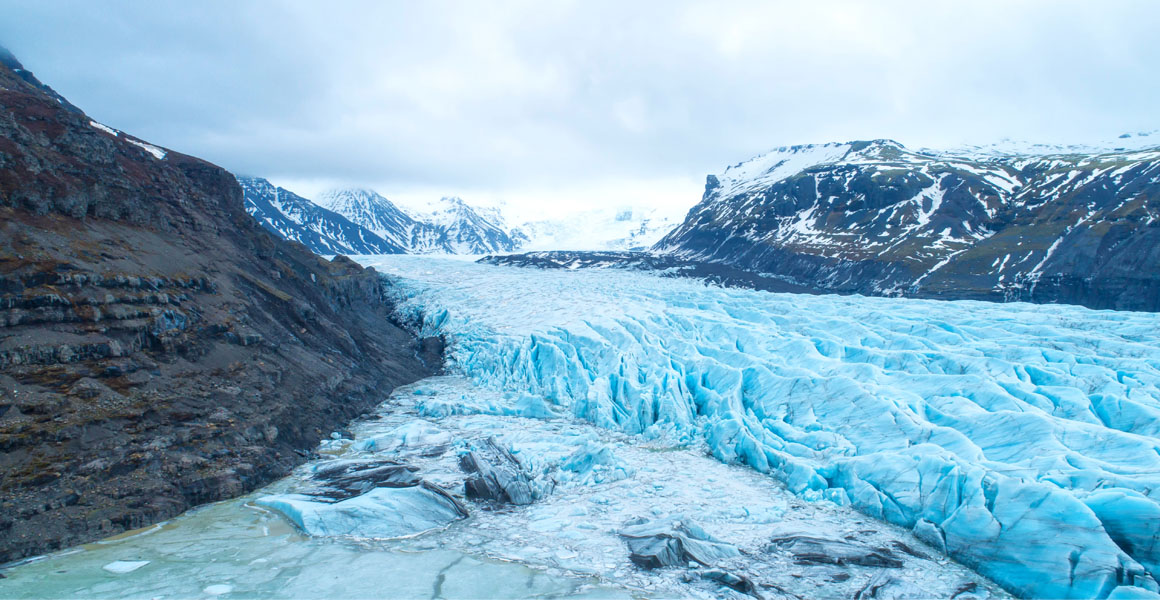 Glacier between mountains in iceland