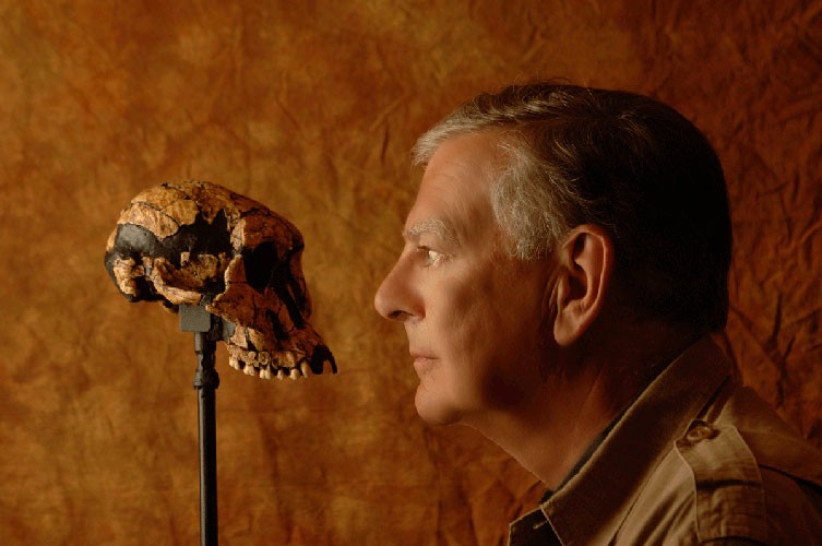 Donald Johanson with an early hominin skull 