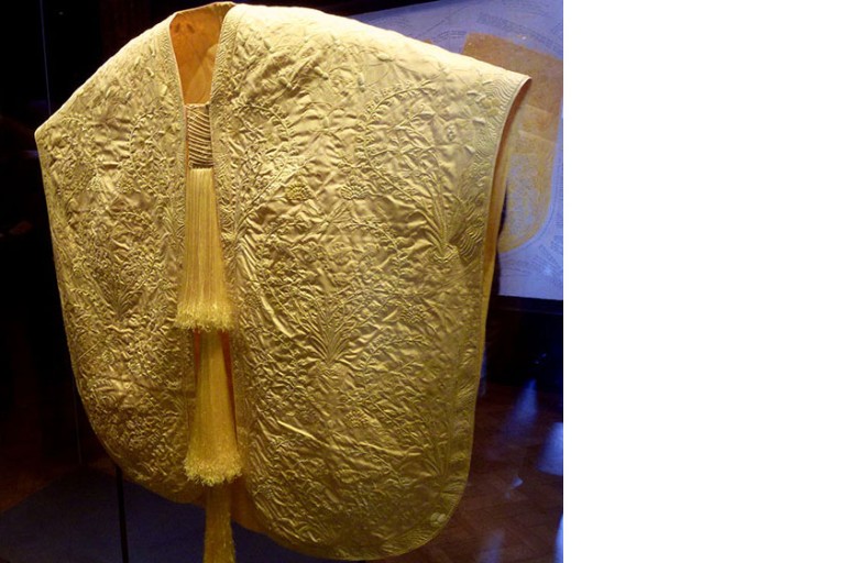 Golden cape made of spider silk